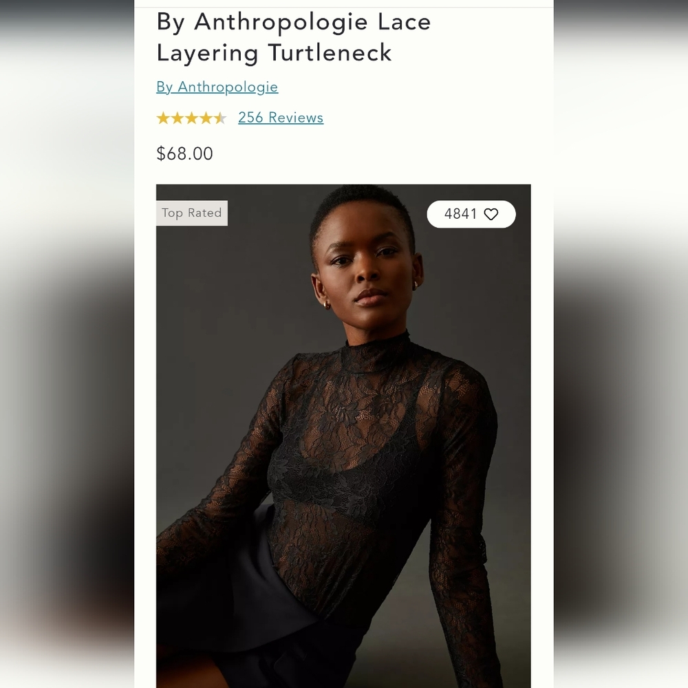 Anthropologie Black Blouse with Elegant Design